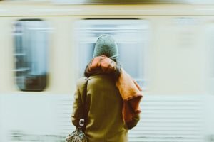 Person standing near train