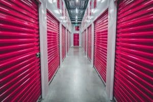 Storage units with purple shutter doors.