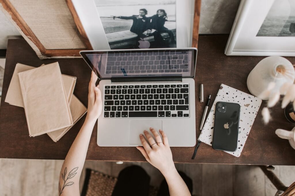 Woman with an open laptop.